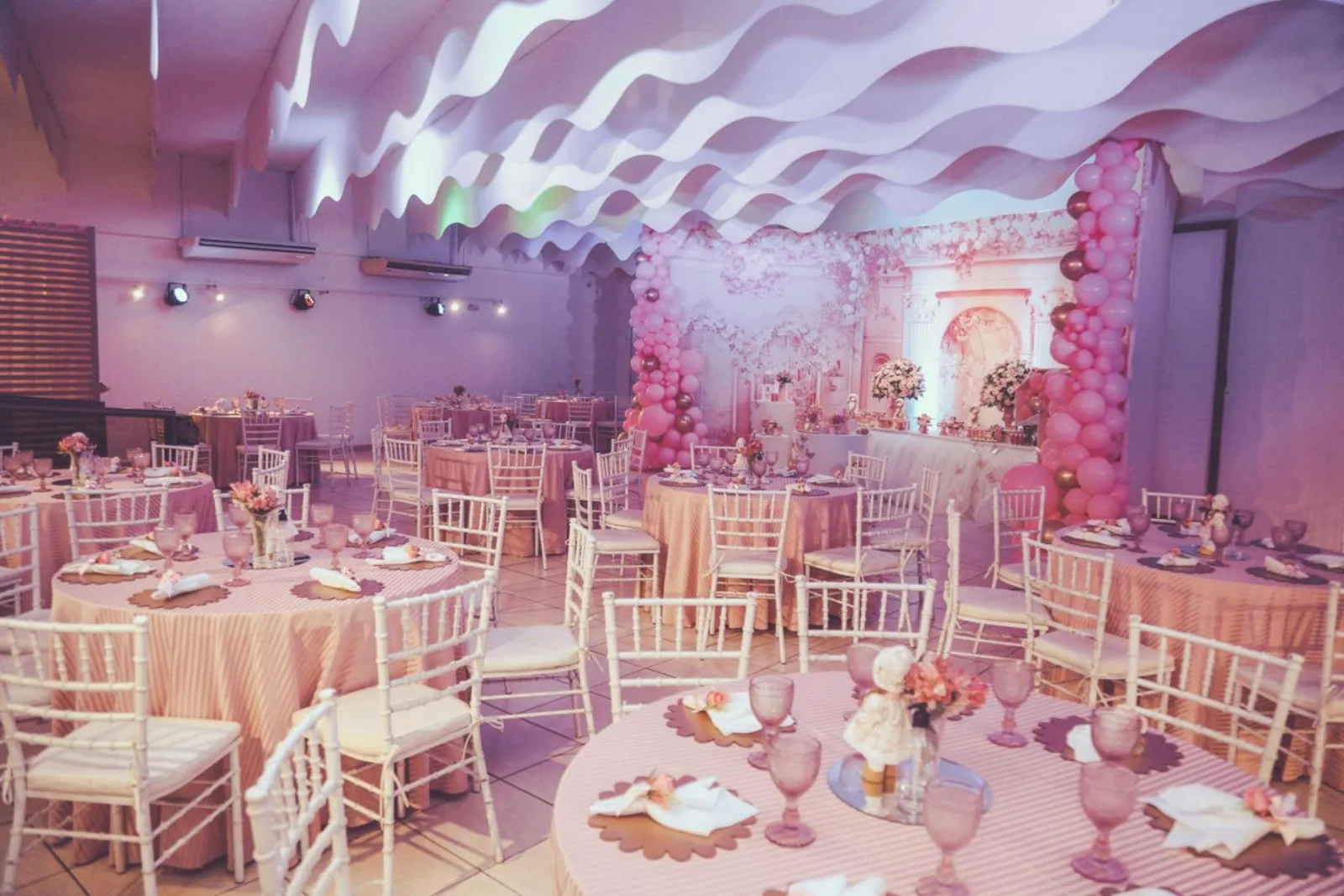 Banquet tables set for a birthday celebration
