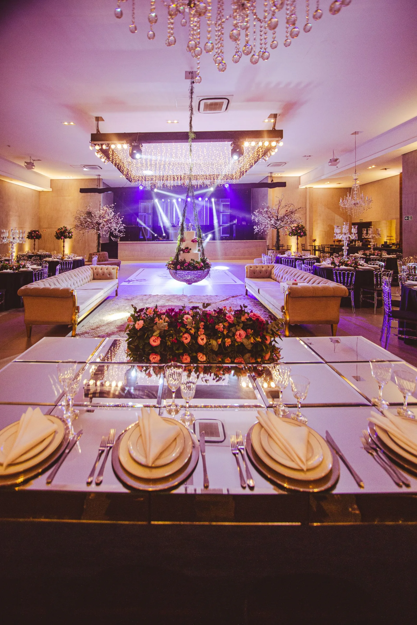 Wedding stage with floral wall and thrones