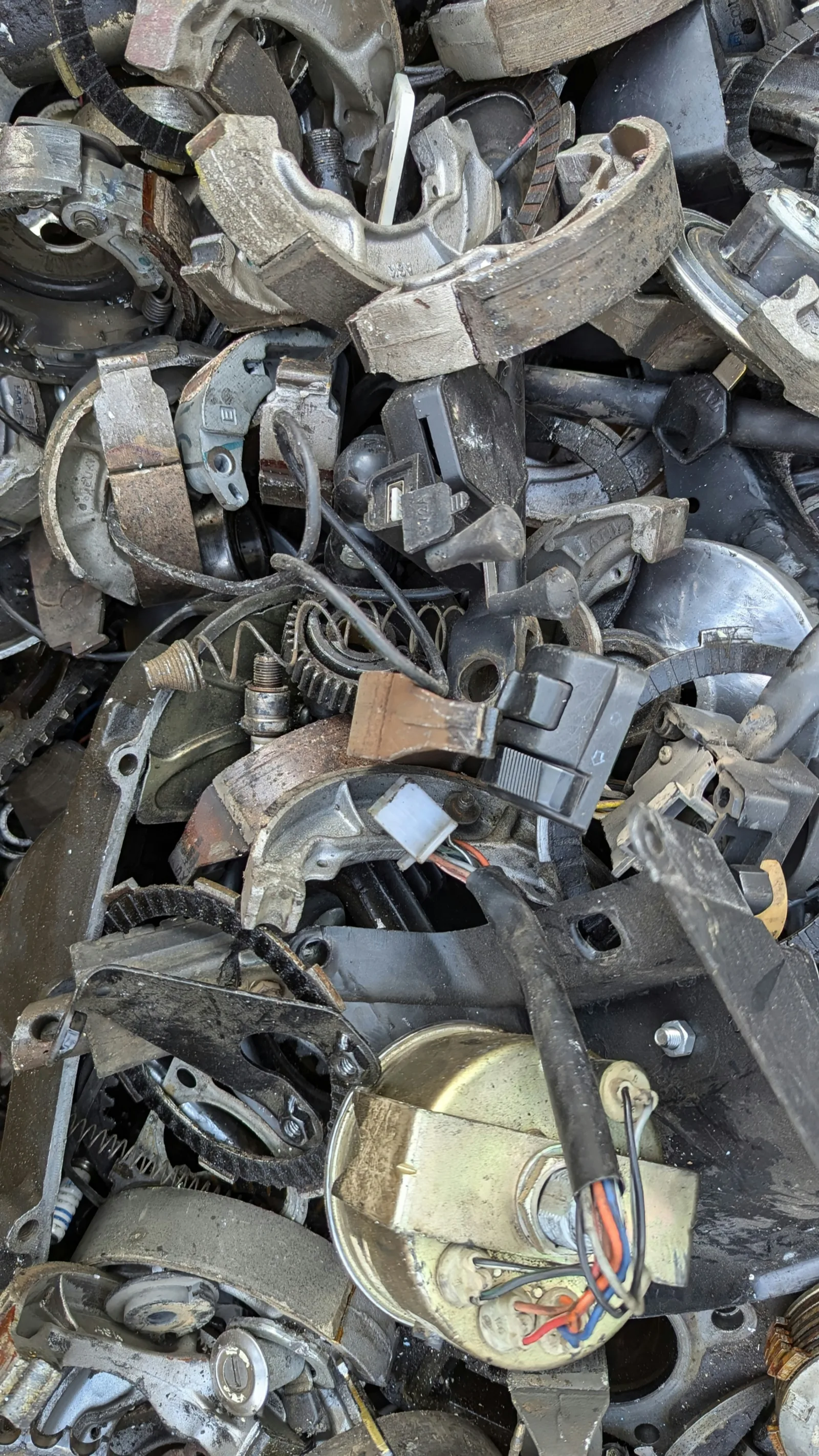 Scrap metal being sorted at a recycling yard